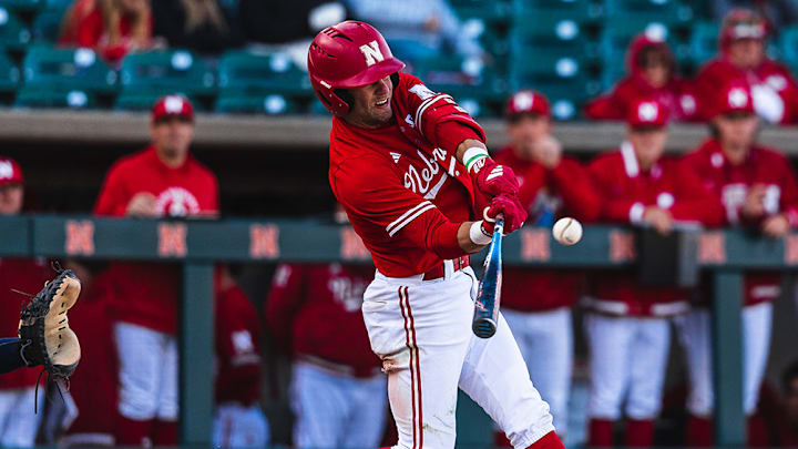 Nebraska second baseman Jett Buck launches a grand slam against Penn State at Haymarket Park. Nebraska second baseman Jett Buck launches a grand slam against Penn State at Haymarket Park.