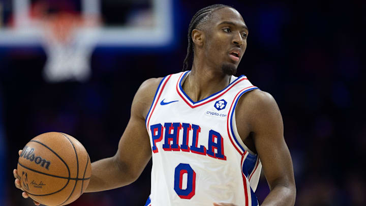 Jan 15, 2025; Philadelphia, Pennsylvania, USA; Philadelphia 76ers guard Tyrese Maxey (0) controls the ball against the New York Knicks during the third quarter at Wells Fargo Center. Mandatory Credit: Bill Streicher-Imagn Images