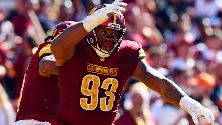 Oct 6, 2024; Landover, Maryland, USA; Washington Commanders defensive tackle Jonathan Allen (93) celebrates after a tackle during the second quarter against the Cleveland Browns at NorthWest Stadium. Mandatory Credit: Peter Casey-Imagn Images