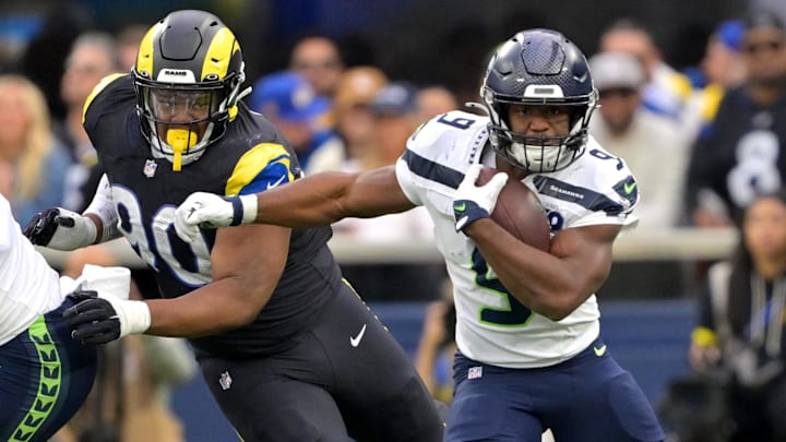 Nov 16, 2025; Inglewood, California, USA; Seattle Seahawks running back Kenneth Walker III (9) carries the ball against the Los Angeles Rams at SoFi Stadium. Nov 16, 2025; Inglewood, California, USA; Seattle Seahawks running back Kenneth Walker III (9) carries the ball against the Los Angeles Rams at SoFi Stadium.