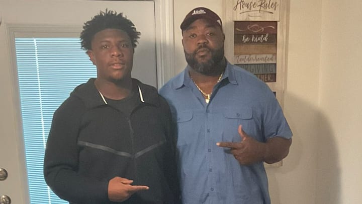 South Oak Cliff (Texas) defensive lineman Jaderian Jones with Mississippi State defensive line coach Ty Warren.