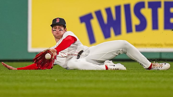 Boston Red Sox outfielder Roman Anthony (19) makes the catch against the Tampa Bay Rays in the sixth inning at Fenway Park.