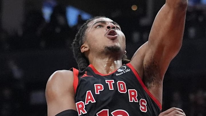Apr 23, 2026; Toronto, Ontario, CAN; Toronto Raptors forward Collin Murray-Boyles (12) dunks against the Cleveland Cavaliers during the first half of game three of the first round of the 2026 NBA Playoffs at Scotiabank Arena. Mandatory Credit: John E. Sokolowski-Imagn Images