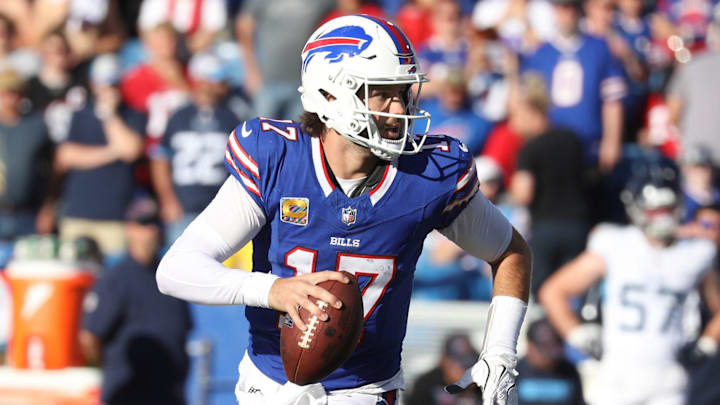 Bills quarterback Josh Allen runs laterally looking for an open receiver during second half action at Highmark Stadium in Orchard Park on Oct. 20, 2024. Bills quarterback Josh Allen runs laterally looking for an open receiver during second half action at Highmark Stadium in Orchard Park on Oct. 20, 2024.
