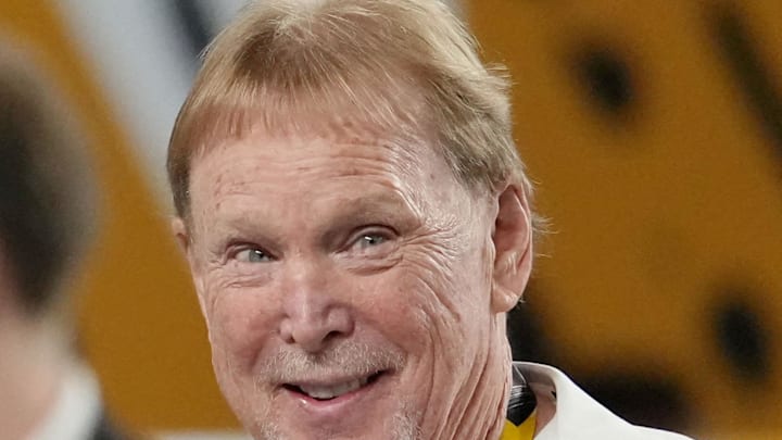 Jan 19, 2026; Miami Gardens, FL, USA; Las Vegas Raiders owner Mark Davis walks on the sideline before the CFP National Championship college football game between the Indiana Hoosiers and the Miami Hurricanes at Hard Rock Stadium. Mandatory Credit: Kirby Lee-Imagn Images