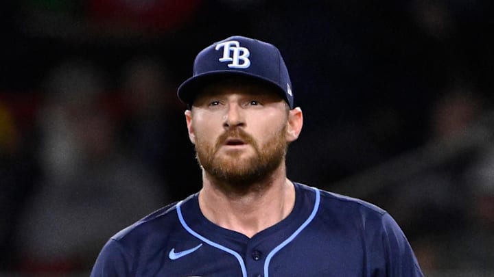 Tampa Bay Rays relief pitcher Bryan Baker (47) looks on from the mound during the seventh inning against the Boston Red Sox at Fenway Park. Tampa Bay Rays relief pitcher Bryan Baker (47) looks on from the mound during the seventh inning against the Boston Red Sox at Fenway Park.