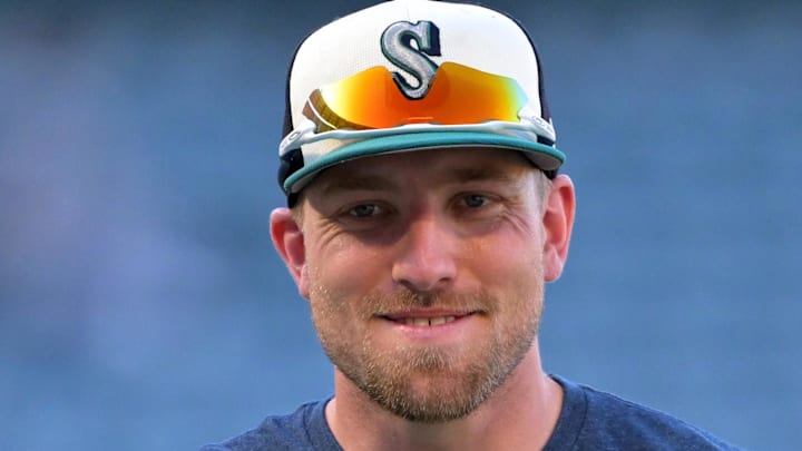 Seattle Mariners right fielder Luke Raley (20) warms up prior to the game against the Los Angeles Angels at Angel Stadium on July 24. Seattle Mariners right fielder Luke Raley (20) warms up prior to the game against the Los Angeles Angels at Angel Stadium on July 24.