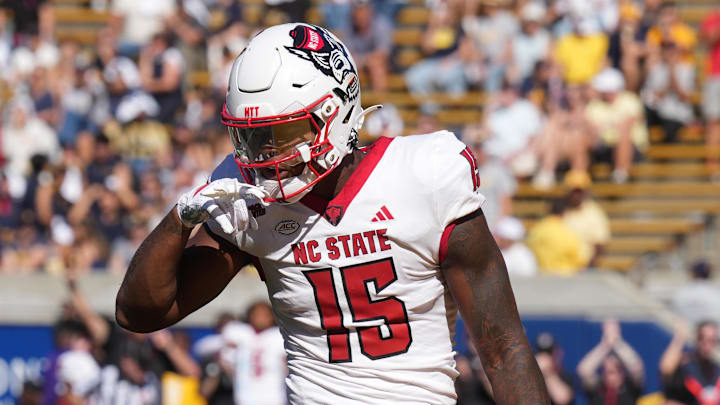Oct 19, 2024; Berkeley, California, USA; North Carolina State Wolfpack tight end Justin Joly (15) gestures after catching a pass against California Golden Bears defensive back Cam Sidney (20) during the second quarter at California Memorial Stadium. Mandatory Credit: Darren Yamashita-Imagn Images Oct 19, 2024; Berkeley, California, USA; North Carolina State Wolfpack tight end Justin Joly (15) gestures after catching a pass against California Golden Bears defensive back Cam Sidney (20) during the second quarter at California Memorial Stadium. Mandatory Credit: Darren Yamashita-Imagn Images