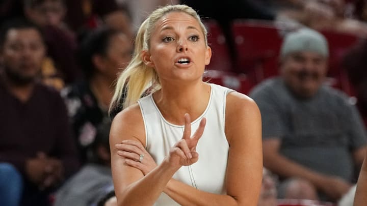 ASU Sun Devils head coach Molly Miller yells out to her team as they play the Coppin State Bald Eagles at Desert Financial Arena on Nov. 3, 2025. ASU Sun Devils head coach Molly Miller yells out to her team as they play the Coppin State Bald Eagles at Desert Financial Arena on Nov. 3, 2025.