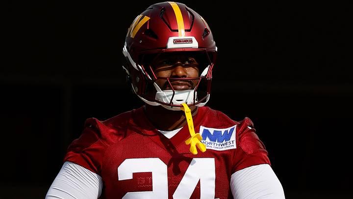 Former Washington Commanders OLB Von Miller walks out of team headquarters onto the field. Former Washington Commanders OLB Von Miller walks out of team headquarters onto the field.
