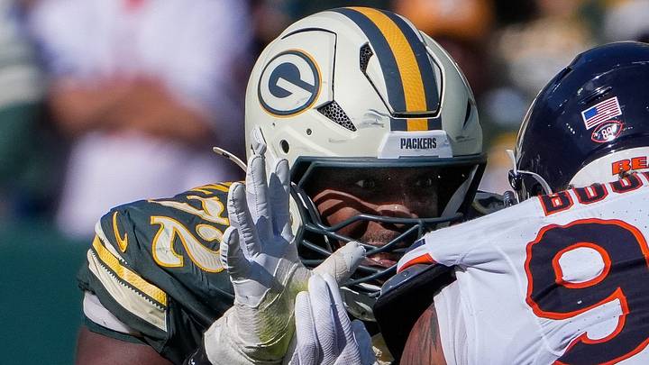 Green Bay Packers guard Laken Tomlinson (72) blocks Chicago Bears defensive end Austin Booker. Green Bay Packers guard Laken Tomlinson (72) blocks Chicago Bears defensive end Austin Booker.