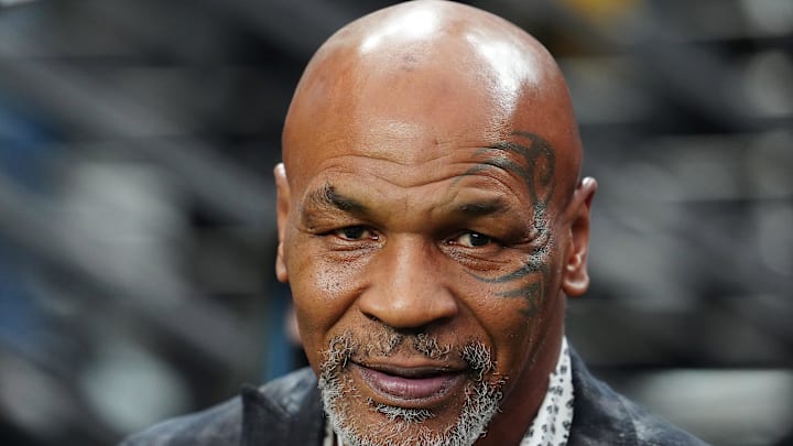 Sep 24, 2023; Paradise, Nevada, USA; Mike Tyson poses for a photo on the sidelines before the start of a game between the Las Vegas Raiders and the Pittsburgh Steelers at Allegiant Stadium. Mandatory Credit: Stephen R. Sylvanie-Imagn Images