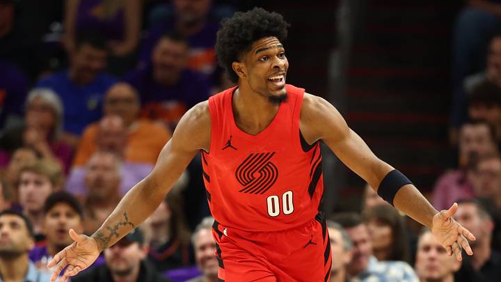 Apr 14, 2026; Phoenix, Arizona, USA; Portland Trail Blazers guard Scoot Henderson (00) reacts against the Phoenix Suns in the first half during the play-in rounds of the 2026 NBA Playoffs at Mortgage Matchup Center. Mandatory Credit: Mark J. Rebilas-Imagn Images