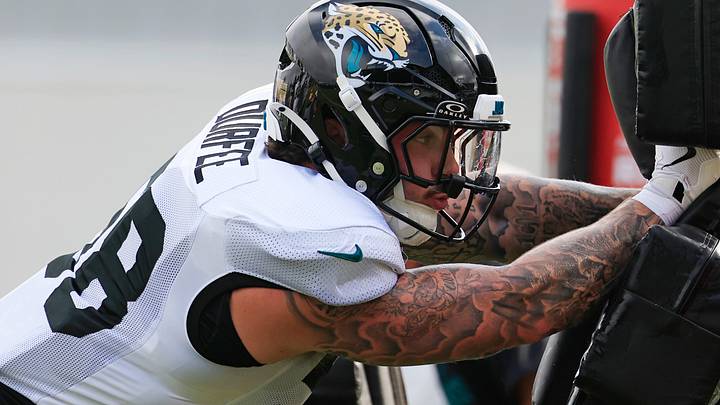 Jacksonville Jaguars defensive end Zach Durfee (58) hits the blocking sled during the sixth day of NFL training camp at the Miller Electric Center on Tuesday, Aug. 4, 2026, in Jacksonville, Fla.