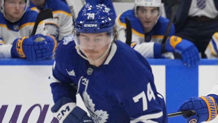 Jan 27, 2026; Toronto, Ontario, CAN; Buffalo Sabres defenseman Bowen Byram (4) tries to slow down Toronto Maple Leafs forward Bobby McMann (74) during the third period at Scotiabank Arena. Mandatory Credit: John E. Sokolowski-Imagn Images Jan 27, 2026; Toronto, Ontario, CAN; Buffalo Sabres defenseman Bowen Byram (4) tries to slow down Toronto Maple Leafs forward Bobby McMann (74) during the third period at Scotiabank Arena. Mandatory Credit: John E. Sokolowski-Imagn Images