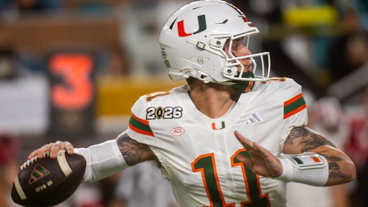 Miami's Carson Beck (11) throws during the College Football Playoff National Championship college football game at Hard Rock Stadium in Miami Gardens on Monday, Jan. 19, 2026.