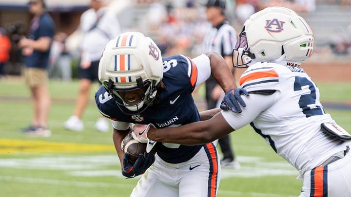 Auburn Tigers wide receiver DeShawn Spencer (9) turns up field during Auburn Tigers A-Day spring game at Jordan-Hare Stadium in Auburn, Ala. on Saturday, April 18, 2026. Auburn Tigers wide receiver DeShawn Spencer (9) turns up field during Auburn Tigers A-Day spring game at Jordan-Hare Stadium in Auburn, Ala. on Saturday, April 18, 2026.