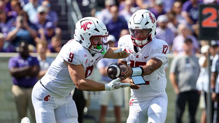 Sep 12, 2026; Manhattan, Kansas, USA; Washington State Cougars running back Kirby Vorhees (9) takes the handoff from quarterback Caden Pinnick (12).