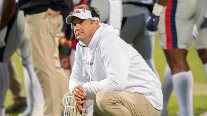 Ole Miss coach Lane Kiffin looks up at the scoreboard during a time out in second half of the Egg Bowl at Davis Wade Stadium in Starkville, Miss.