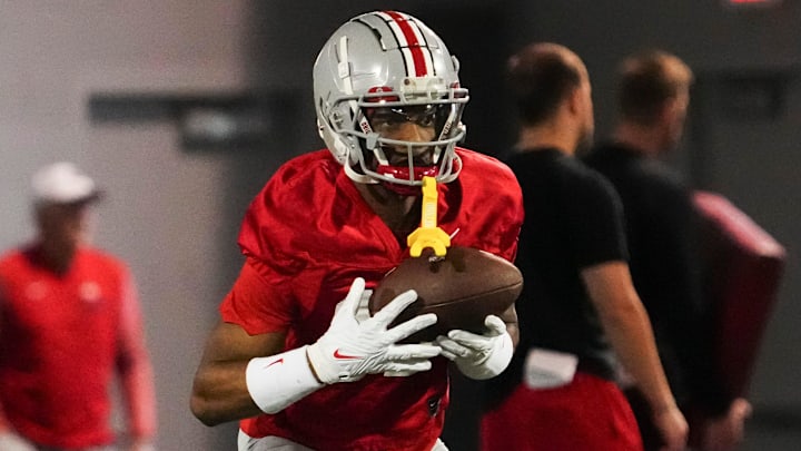 Mar 7, 2024; Columbus, OH, USA; Ohio State Buckeyes wide receiver Carnell Tate (17) returns a punt Mar 7, 2024; Columbus, OH, USA; Ohio State Buckeyes wide receiver Carnell Tate (17) returns a punt