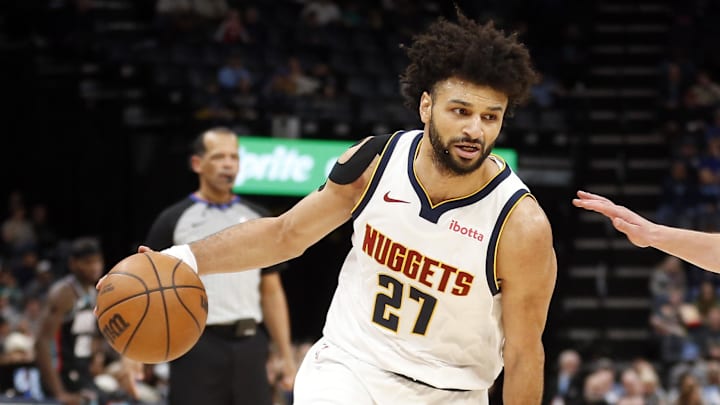 Mar 18, 2026; Memphis, Tennessee, USA; Denver Nuggets guard Jamal Murray (27) drives to the basket as Memphis Grizzlies guard Ty Jerome (2) defends during the fourth quarter at FedExForum. Mandatory Credit: Petre Thomas-Imagn Images Mar 18, 2026; Memphis, Tennessee, USA; Denver Nuggets guard Jamal Murray (27) drives to the basket as Memphis Grizzlies guard Ty Jerome (2) defends during the fourth quarter at FedExForum. Mandatory Credit: Petre Thomas-Imagn Images