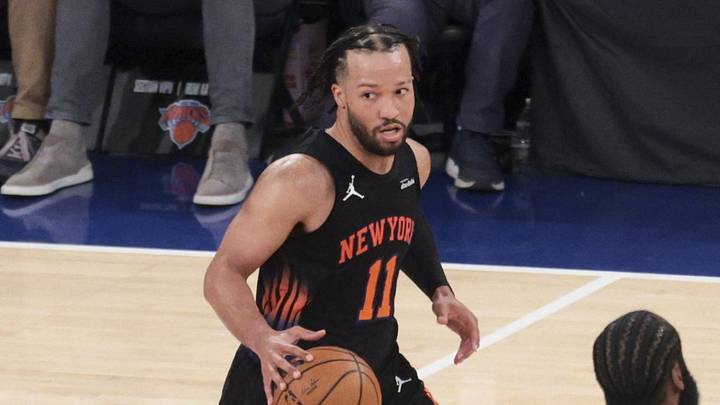 New York Knicks guard Jalen Brunson (11) dribbles against Cleveland Cavaliers guard James Harden (1) during the third quarter of game two of the eastern conference finals of the 2026 NBA playoffs at Madison Square Garden.
