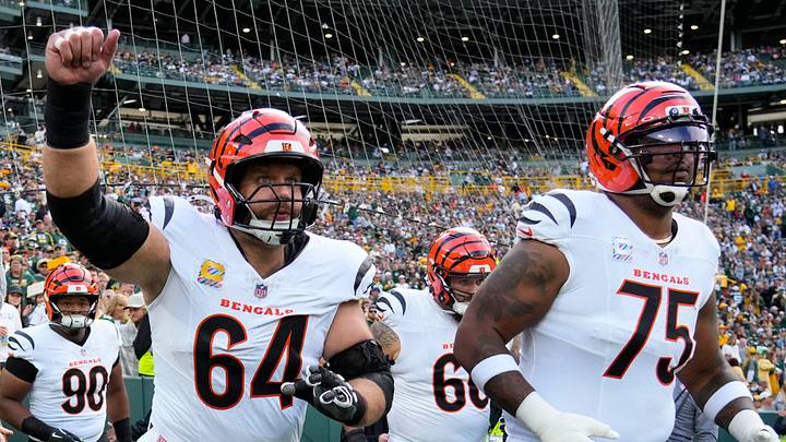 Oct 12, 2025; Green Bay, Wisconsin, USA; Cincinnati Bengals center Ted Karras (64) and offensive tackle Orlando Brown Jr. (75) take to the field prior to the game against the Green Bay Packers at Lambeau Field. Mandatory Credit: Jeff Hanisch-Imagn Images Oct 12, 2025; Green Bay, Wisconsin, USA; Cincinnati Bengals center Ted Karras (64) and offensive tackle Orlando Brown Jr. (75) take to the field prior to the game against the Green Bay Packers at Lambeau Field. Mandatory Credit: Jeff Hanisch-Imagn Images