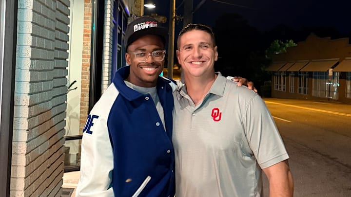 Oklahoma commit Samuel Nelson, defensive ends coach Miguel Chavis.