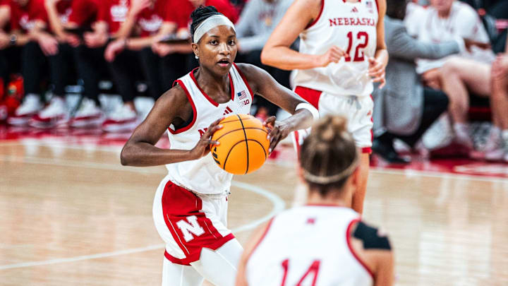 Nebraska guard Hailey Weaver looks to pass to Callin Hake against the California Baptist Lancers. 