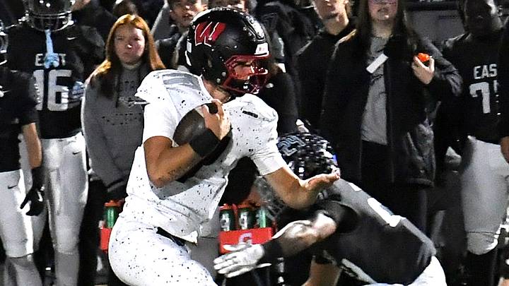 Quarterback Jackson Smith pushes ahead for a Lakota West first down at the Lakota East vs. Lakota West Greater Miami Conference football game, Oct. 24, 2025. Quarterback Jackson Smith pushes ahead for a Lakota West first down at the Lakota East vs. Lakota West Greater Miami Conference football game, Oct. 24, 2025.