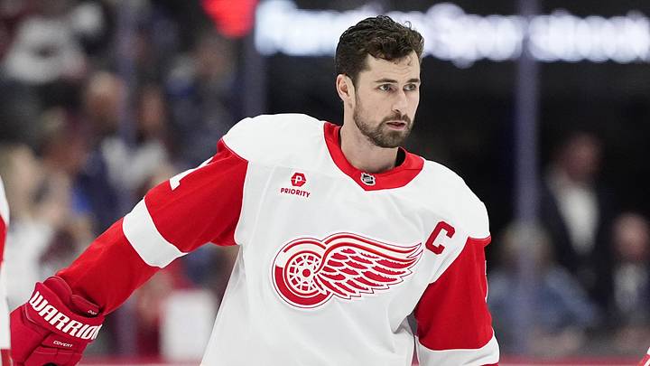 Mar 25, 2025; Denver, Colorado, USA; Detroit Red Wings center Dylan Larkin (71) before the game against the Colorado Avalanche at Ball Arena. Mandatory Credit: Ron Chenoy-Imagn Images Mar 25, 2025; Denver, Colorado, USA; Detroit Red Wings center Dylan Larkin (71) before the game against the Colorado Avalanche at Ball Arena. Mandatory Credit: Ron Chenoy-Imagn Images