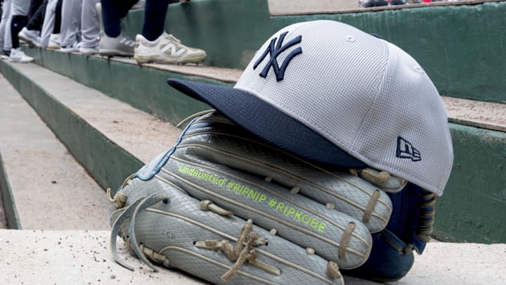 Detail view of gloves and a hat in the New York Yankees dugout during the game against the Minnesota Twins at Lee Health Sports Complex on Feb. 25. Detail view of gloves and a hat in the New York Yankees dugout during the game against the Minnesota Twins at Lee Health Sports Complex on Feb. 25.