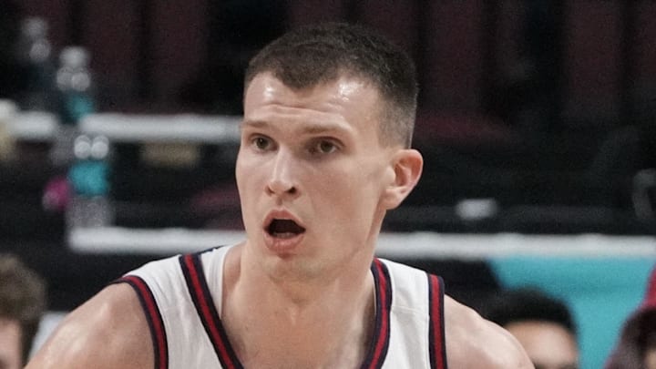 March 9, 2026; Las Vegas, NV, USA; Saint Mary's Gaels forward Paulius Murauskas (23) dribbles the basketball against Santa Clara Broncos guard Christian Hammond (1) during the first half at Orleans Arena. Mandatory Credit: Kyle Terada-Imagn Images