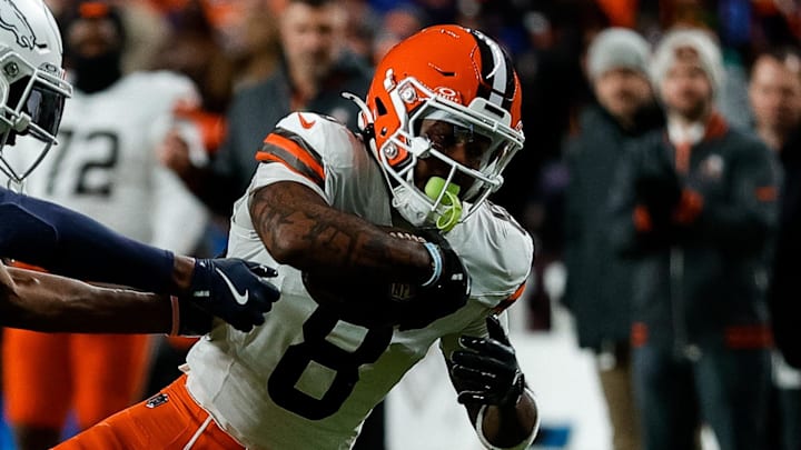Dec 2, 2024; Denver, Colorado, USA; Cleveland Browns wide receiver Elijah Moore (8)r reaches for extra yards against Denver Broncos cornerback Levi Wallace (39) in the first quarter at Empower Field at Mile High. Mandatory Credit: Isaiah J. Downing-Imagn Images Dec 2, 2024; Denver, Colorado, USA; Cleveland Browns wide receiver Elijah Moore (8)r reaches for extra yards against Denver Broncos cornerback Levi Wallace (39) in the first quarter at Empower Field at Mile High. Mandatory Credit: Isaiah J. Downing-Imagn Images