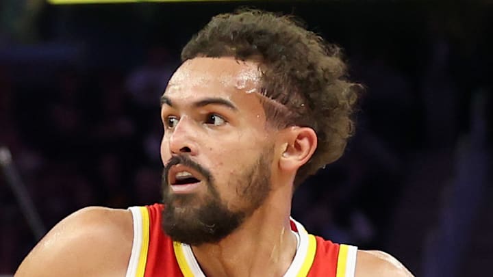 Trae Young #11 of the Atlanta Hawks drives against the Golden State Warriors.