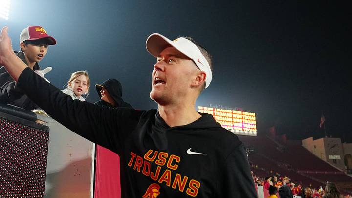 Southern California Trojans head coach Lincoln Riley celebrates with fans after the game against the UCLA Bruins at United Airlines Field at Los Angeles Memorial Coliseum. Southern California Trojans head coach Lincoln Riley celebrates with fans after the game against the UCLA Bruins at United Airlines Field at Los Angeles Memorial Coliseum.