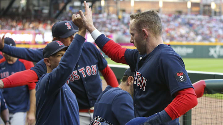 Boston Red Sox SS Trevor Story, manager Alex Cora