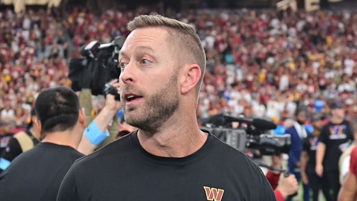 Sep 29, 2024; Glendale, Arizona, USA; Washington Commanders offensive coordinator Kliff Kingsbury reacts after beating the Arizona Cardinals at State Farm Stadium. Mandatory Credit: Matt Kartozian-Imagn Images Sep 29, 2024; Glendale, Arizona, USA; Washington Commanders offensive coordinator Kliff Kingsbury reacts after beating the Arizona Cardinals at State Farm Stadium. Mandatory Credit: Matt Kartozian-Imagn Images