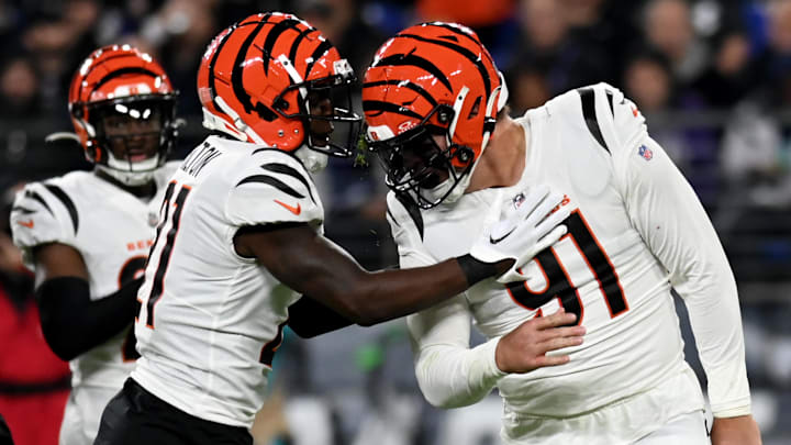 Nov 16, 2023; Baltimore, Maryland, USA; Cincinnati Bengals cornerback Mike Hilton (21) and defensive end Trey Hendrickson (91) celebrate after a play during the second quarter against the Baltimore Ravens at M&T Bank Stadium. Mandatory Credit: Tommy Gilligan-Imagn Images