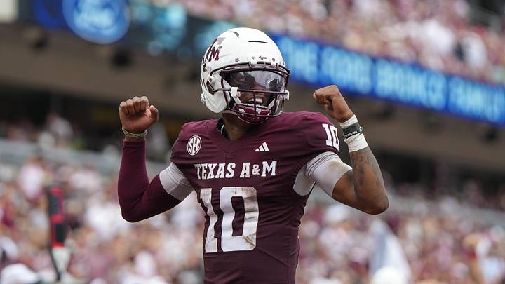 Sep 6, 2025; College Station, Texas, USA; Texas A&M Aggies quarterback Marcel Reed (10) celebrates after a touchdown pass during the second quarter against the Utah State Aggies at Kyle Field. Mandatory Credit: Sean Thomas-Imagn Images