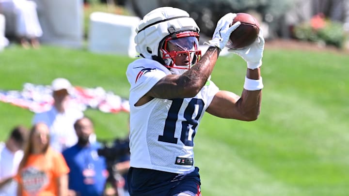Jul 23, 2025; Foxborough, MA, USA; New England Patriots wide receiver Kyle Williams (18) makes a catch during training camp at Gillette Stadium. Mandatory Credit: Eric Canha-Imagn Images