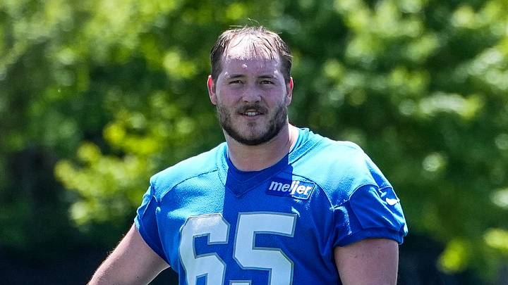 Detroit Lions center Seth McLaughlin (65), left, and guard Michael Niese (62), walk off the field with offensive line coach Hank Fraley after practice during OTAs at Meijer Performance Center in Allen Park on Friday, May 29, 2026. Detroit Lions center Seth McLaughlin (65), left, and guard Michael Niese (62), walk off the field with offensive line coach Hank Fraley after practice during OTAs at Meijer Performance Center in Allen Park on Friday, May 29, 2026.