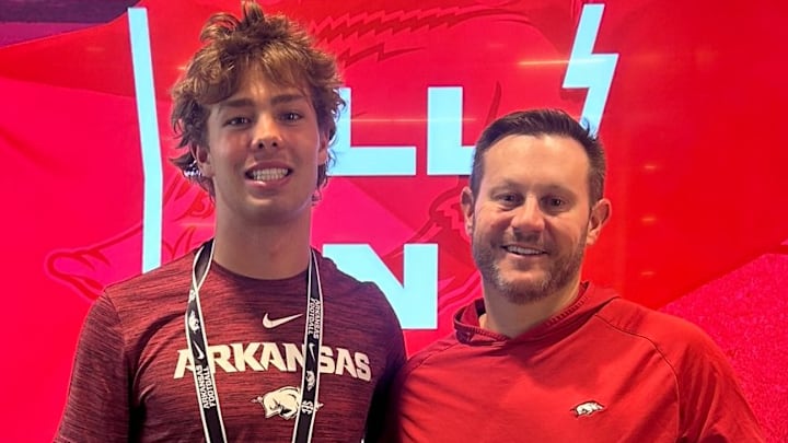 Arkansas Razorbacks coach Ryan Silverfield stands with Newnan, (Ga.) High School 3-star quarterback Brodie Campbell during a recruiting visit April 19.