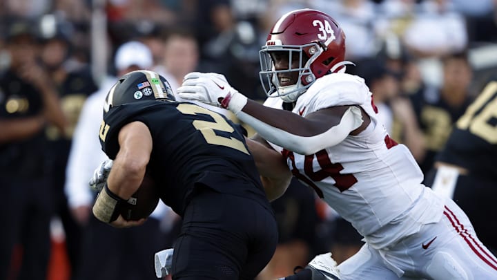 Vanderbilt Commodores quarterback Diego Pavia (2) is sacked by Alabama Crimson Tide linebacker Que Robinson (34) 