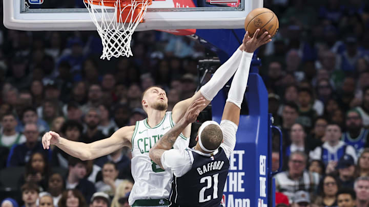 Jan 25, 2025; Dallas, Texas, USA; Boston Celtics center Kristaps Porzingis (8) blocks the shot of Dallas Mavericks center Daniel Gafford (21) during the second half at American Airlines Center. Mandatory Credit: Kevin Jairaj-Imagn Images Jan 25, 2025; Dallas, Texas, USA; Boston Celtics center Kristaps Porzingis (8) blocks the shot of Dallas Mavericks center Daniel Gafford (21) during the second half at American Airlines Center. Mandatory Credit: Kevin Jairaj-Imagn Images