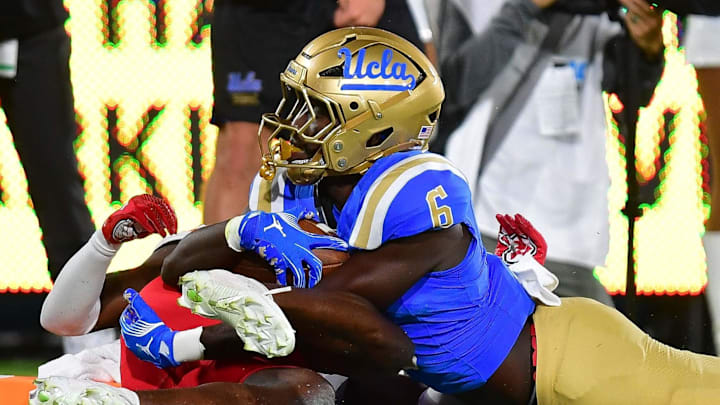 Aug 30, 2025; Pasadena, California, USA; UCLA Bruins running back Anthony Woods (6) scores a touchdown against the Utah Utes during the first half at Rose Bowl. Mandatory Credit: Gary A. Vasquez-Imagn Images Aug 30, 2025; Pasadena, California, USA; UCLA Bruins running back Anthony Woods (6) scores a touchdown against the Utah Utes during the first half at Rose Bowl. Mandatory Credit: Gary A. Vasquez-Imagn Images