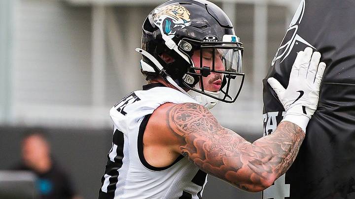Jaguars Zach Durfee (58) runs through tackling dummies during the Jaguars’ fourth OTA of the year, Monday June 1, 2026 at the Miller Electric Center in Jacksonville, Fla. [Doug Engle/Florida Times-Union]
