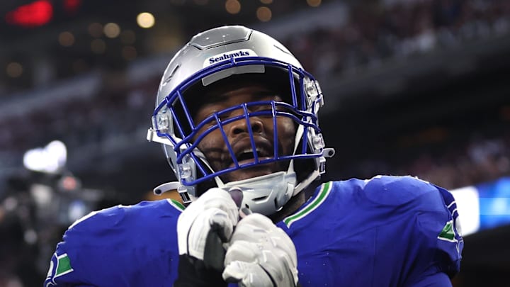 Seattle Seahawks wide receiver DK Metcalf celebrates with guard Anthony Bradford.