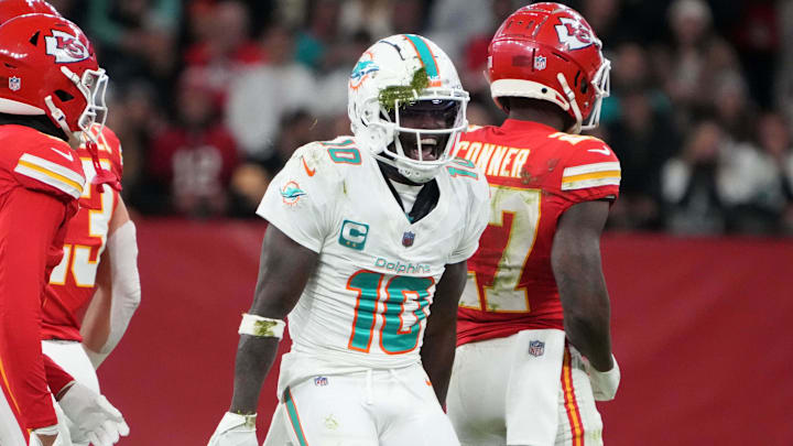 Nov 5, 2023; Frankfurt, Germany; Miami Dolphins wide receiver Tyreek Hill (10) celebrates after a reception against the Kansas City Chiefs during an NFL International Series game at Deutsche Bank Park. Mandatory Credit: Kirby Lee-Imagn Images
