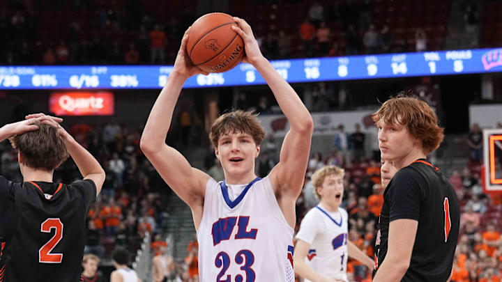 Wisconsin Lutheran's Zavier Zens (23) celebrates his team's 57-55 victory over Marshfield in the WIAA Division 1 state championship game, Saturday, March 22, 2025, at the Kohl Center in Madison, Wis.